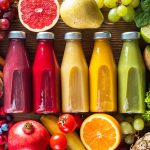 Colorful smoothies in bottles